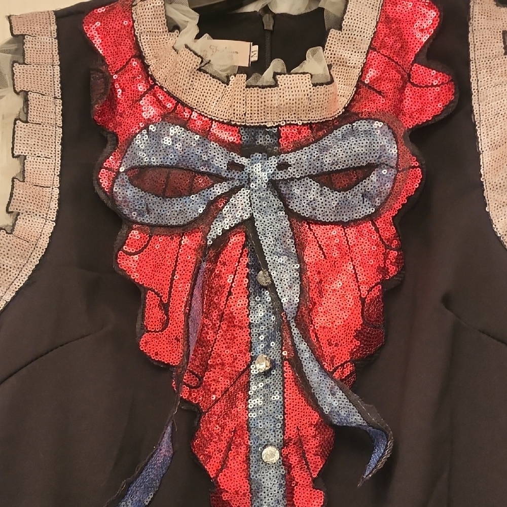 Black Sleeveless Dress with Red and Blue Bow Sequins.